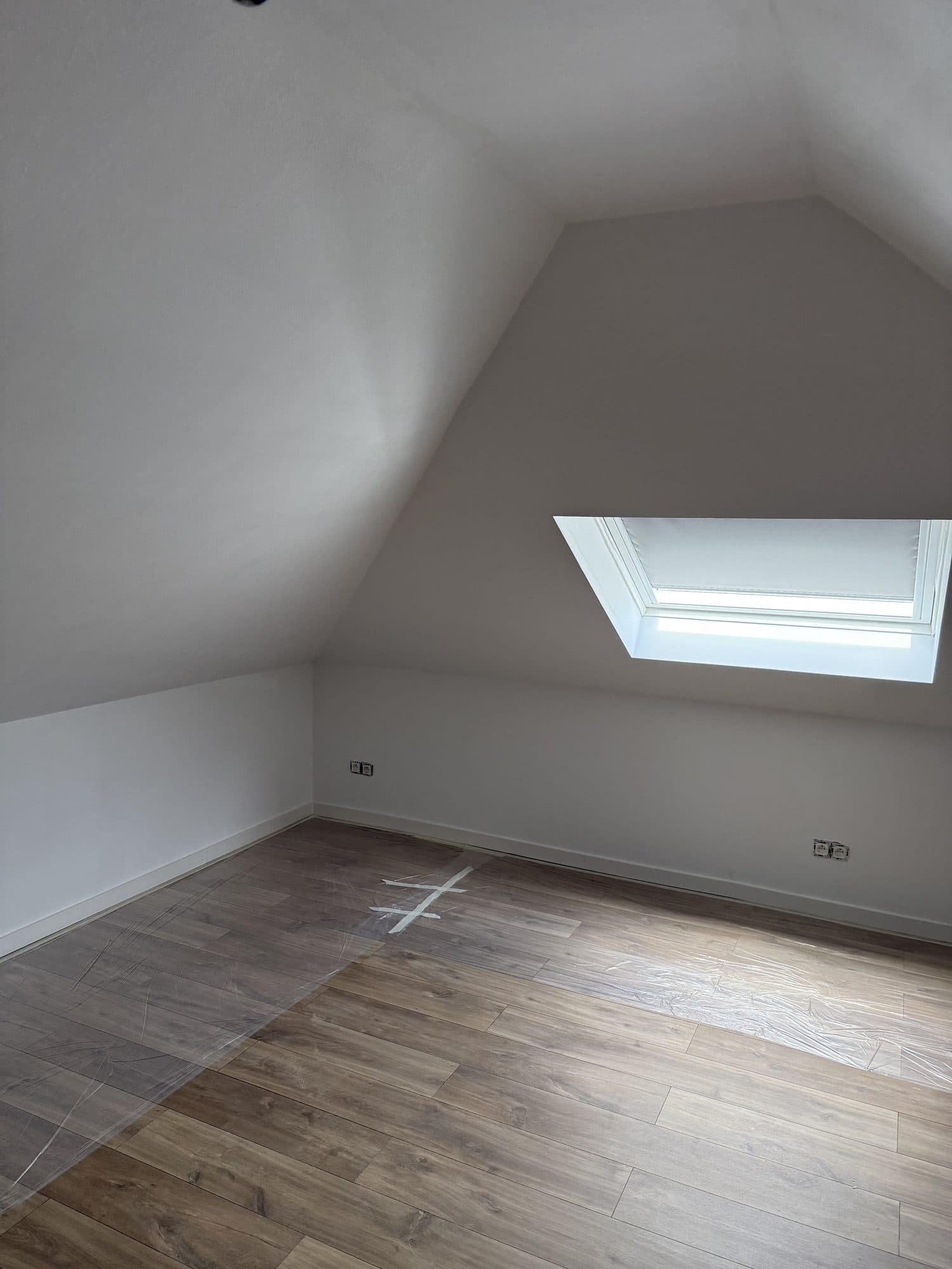 Velux-dakraam met verduistering in Evergem
